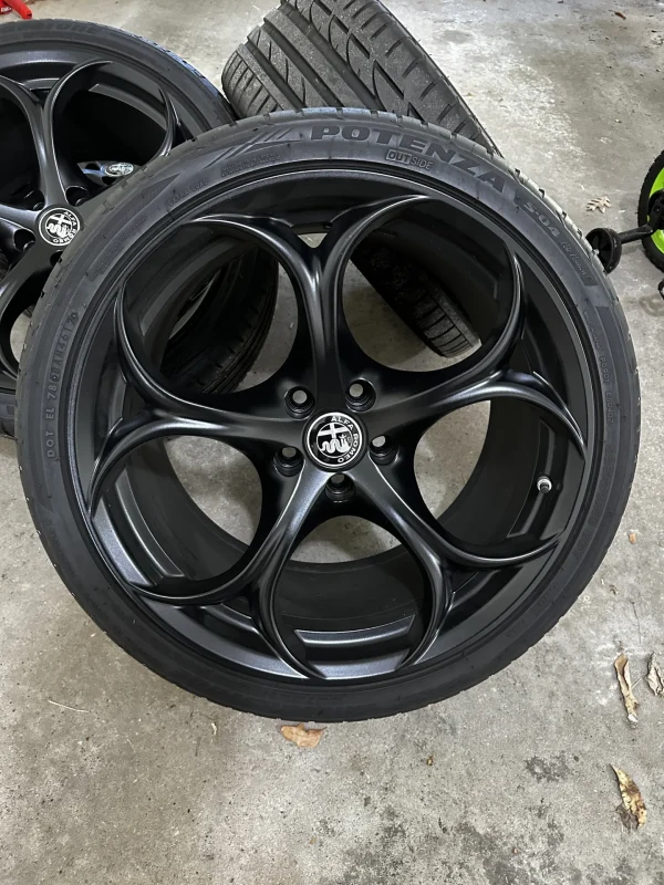 Black QV 5 holes with Potenza S-04 tires and wheels - Image 7