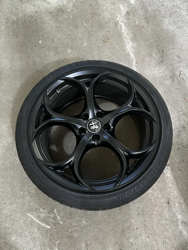 Black QV 5 holes with Potenza S-04 tires and wheels - Image 6